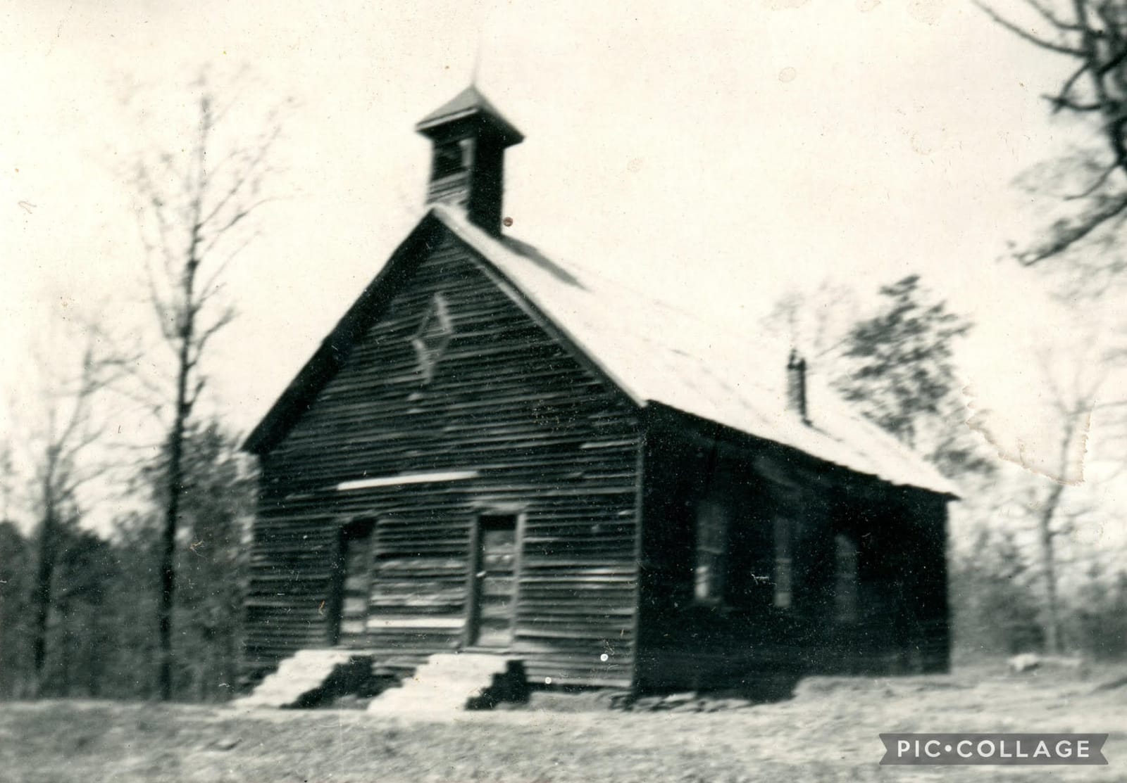 The original wooden Soapstone Baptist Church building, circa 1899